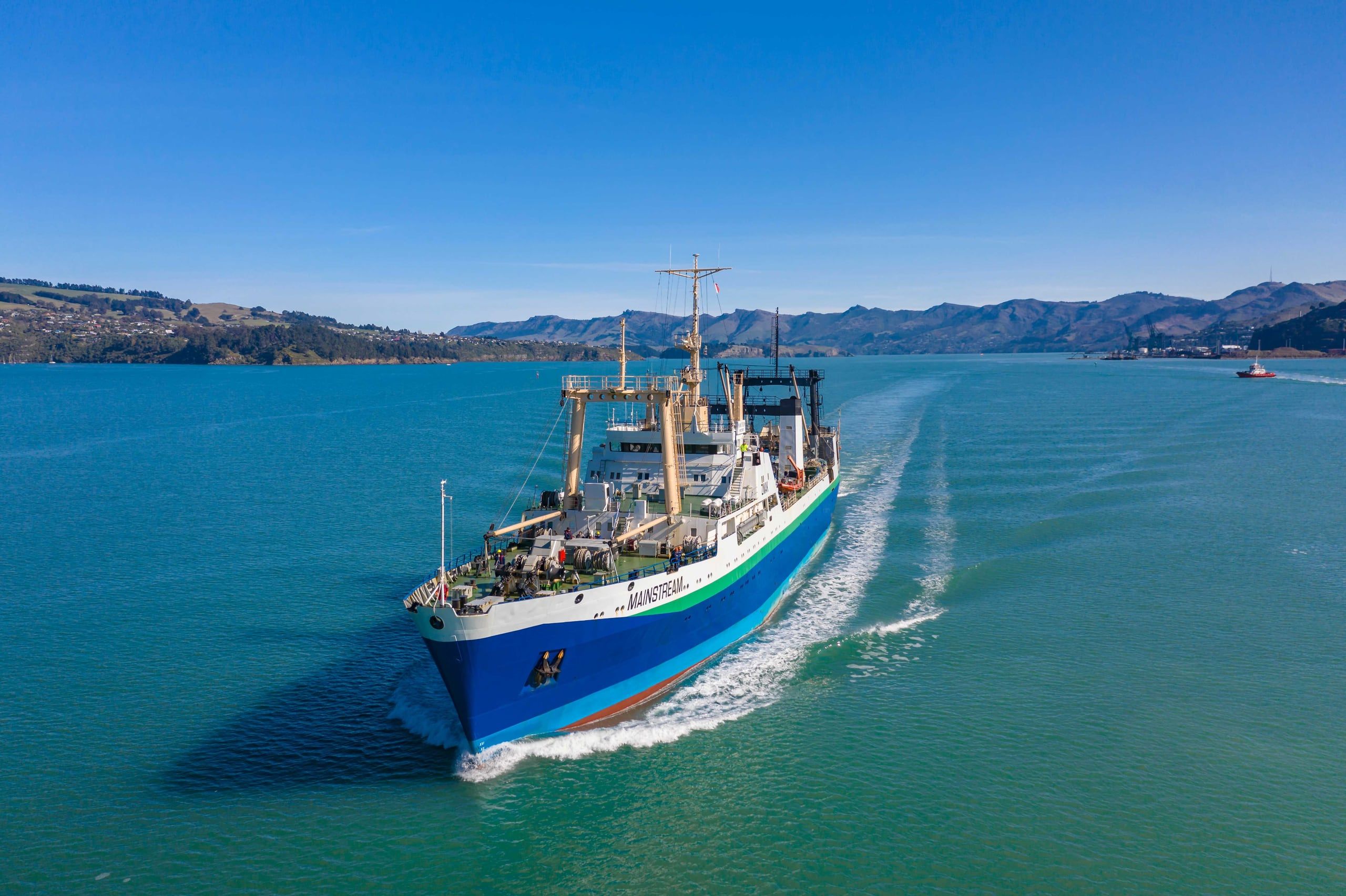 A vessel navigating New Zealand coastal waters